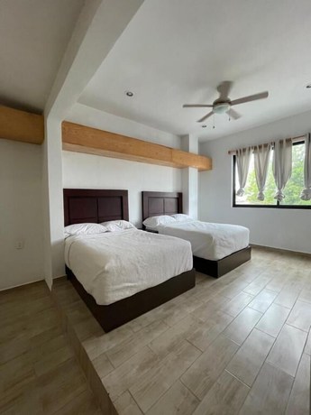 Imagen de la habitación del Hotel SuitesMB. Foto 1