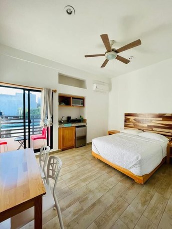 Imagen de la habitación del Hotel SuitesMB. Foto 3