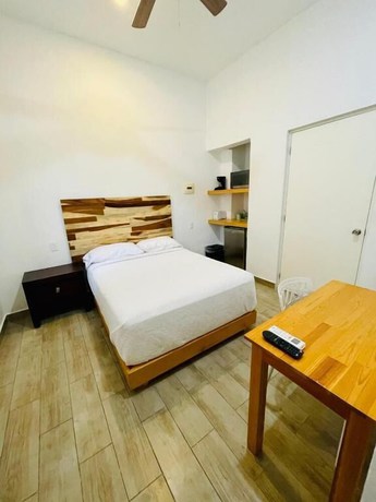 Imagen de la habitación del Hotel SuitesMB. Foto 7