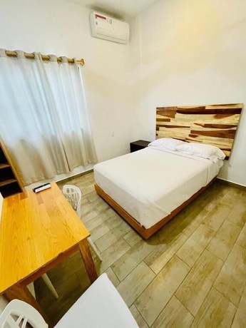 Imagen de la habitación del Hotel SuitesMB. Foto 10