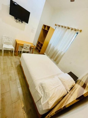 Imagen de la habitación del Hotel SuitesMB. Foto 11