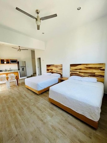 Imagen de la habitación del Hotel SuitesMB. Foto 13