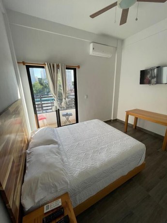 Imagen de la habitación del Hotel SuitesMB. Foto 19