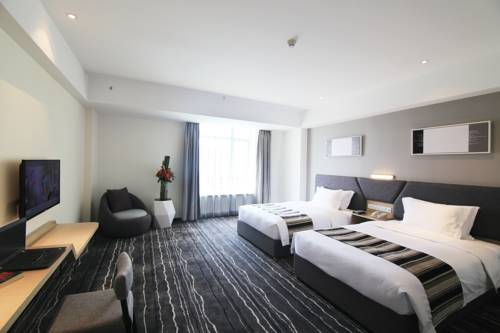 Imagen de la habitación del Hotel Suiton By Pax Pon. Foto 2