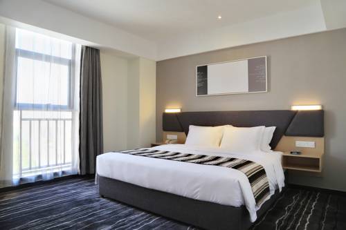Imagen de la habitación del Hotel Suiton By Pax Pon. Foto 6