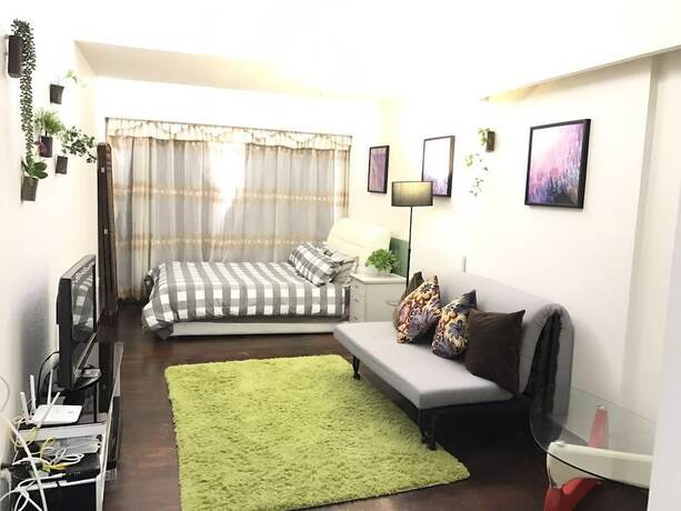 Imagen de la habitación del Hotel Suiyu Apartment. Foto 15