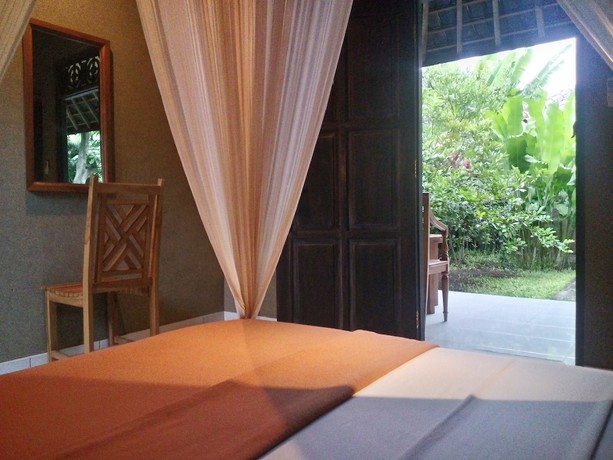 Imagen de la habitación del Hotel Suka Sari Cottages. Foto 2