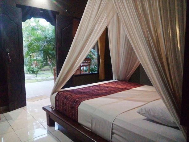 Imagen de la habitación del Hotel Suka Sari Cottages. Foto 3