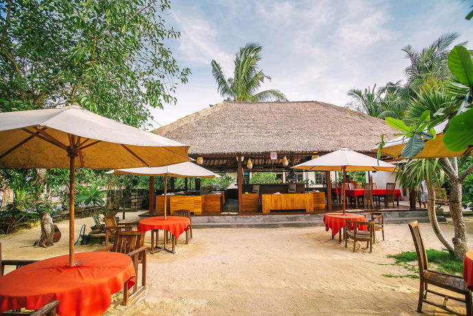 Imagen de la habitación del Hotel Sukanusa Luxury Huts. Foto 8