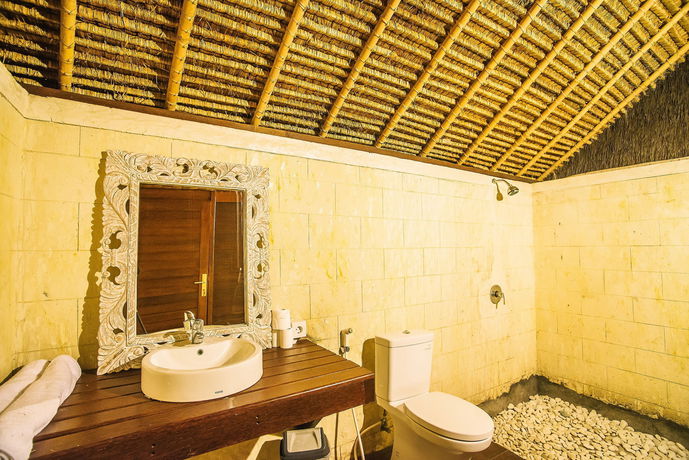 Imagen de la habitación del Hotel Sukanusa Luxury Huts. Foto 12