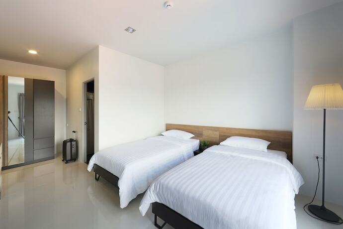 Imagen de la habitación del Hotel Sukh Serviced Apartment. Foto 19