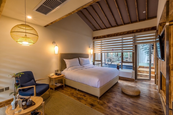 Imagen de la habitación del Hotel Sukham Advesa Emei. Foto 6