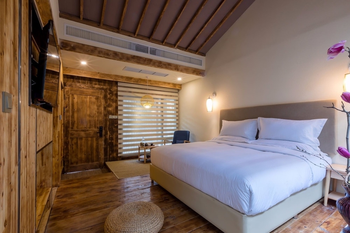 Imagen de la habitación del Hotel Sukham Advesa Emei. Foto 7