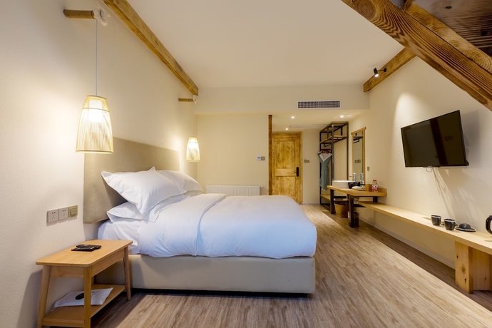 Imagen de la habitación del Hotel Sukham Advesa Emei. Foto 9