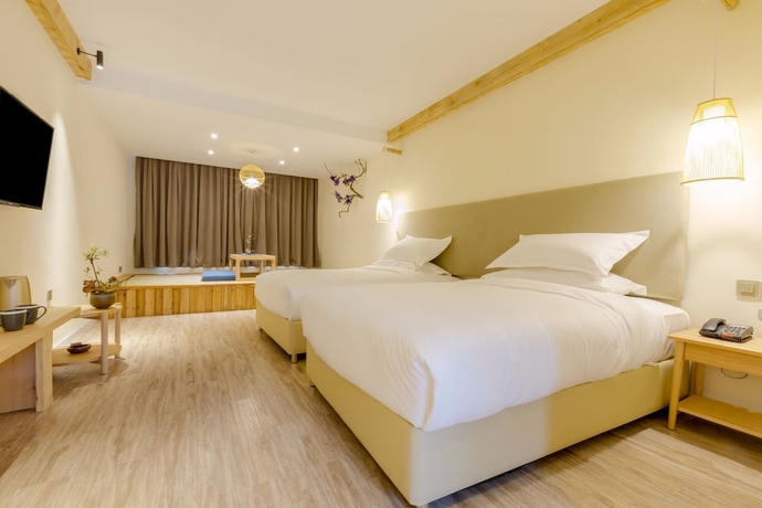 Imagen de la habitación del Hotel Sukham Advesa Emei. Foto 10