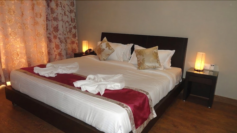 Imagen de la habitación del Hotel Sukhmantra Resort. Foto 11