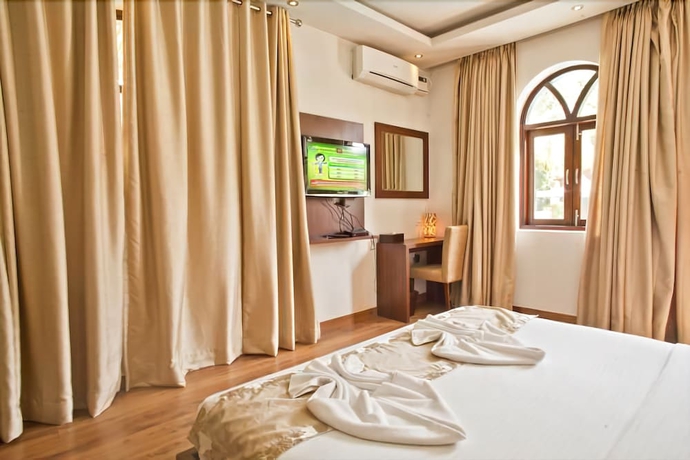 Imagen de la habitación del Hotel Sukhmantra Resort. Foto 14