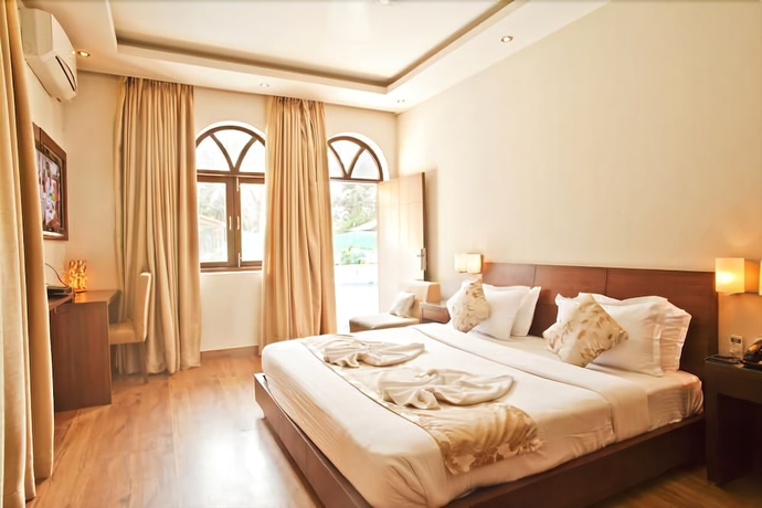 Imagen de la habitación del Hotel Sukhmantra Resort. Foto 16