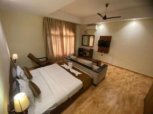 Imagen de la habitación del Hotel Sukhmantra Resort & Spa - Candolim Goa. Foto 19