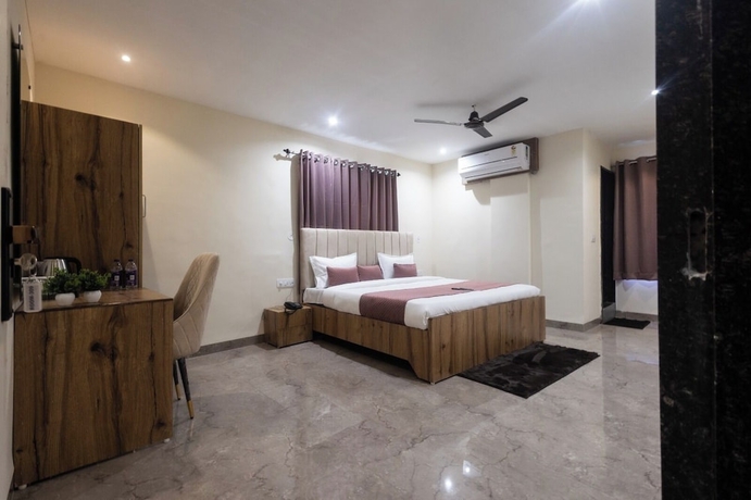 Imagen de la habitación del Hotel Sukoon Prestige Palace. Foto 8