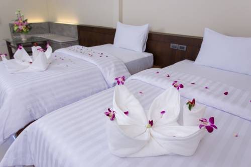 Imagen de la habitación del Hotel Suksompong Resort. Foto 11
