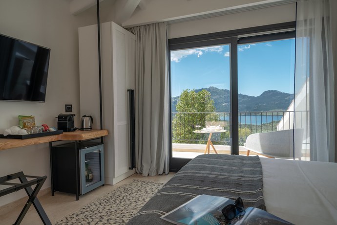 Imagen de la habitación del Hotel Sulia House Porto Rotondo, Curio Collection by Hilton. Foto 12