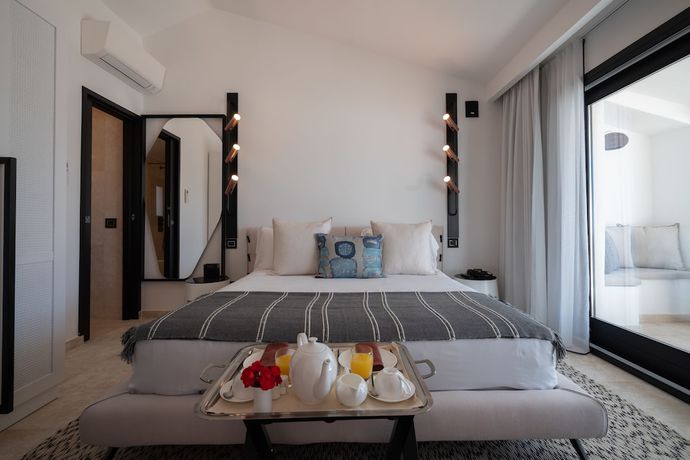 Imagen de la habitación del Hotel Sulia House Porto Rotondo, Curio Collection by Hilton. Foto 13