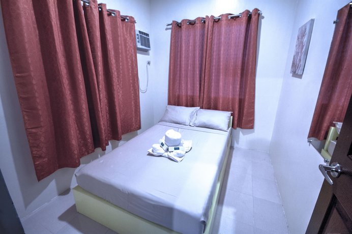 Imagen de la habitación del Hotel Sulit Budget. Foto 2