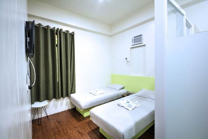 Imagen de la habitación del Hotel Sulit Budget. Foto 7