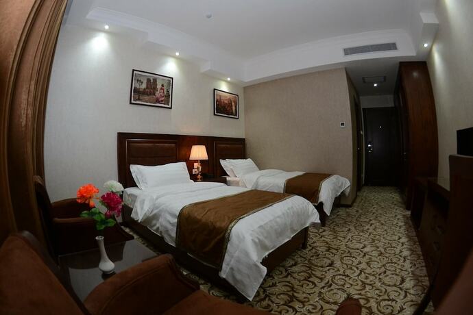Imagen de la habitación del Hotel Sultan, Qarshi. Foto 12