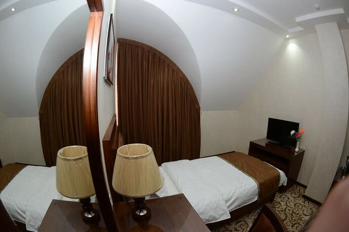 Imagen de la habitación del Hotel Sultan, Qarshi. Foto 14