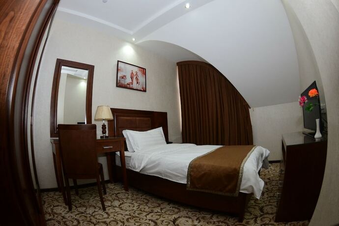 Imagen de la habitación del Hotel Sultan, Qarshi. Foto 16