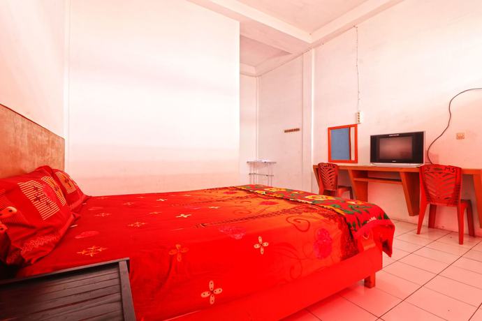 Imagen de la habitación del Hotel Sumber Pulo Mas. Foto 2