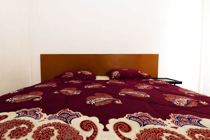 Imagen de la habitación del Hotel Sumber Pulo Mas. Foto 8