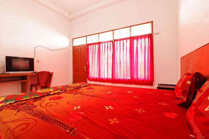 Imagen de la habitación del Hotel Sumber Pulo Mas. Foto 10