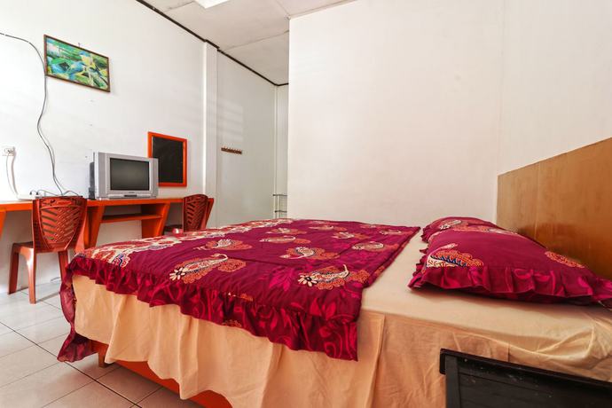 Imagen de la habitación del Hotel Sumber Pulo Mas. Foto 12