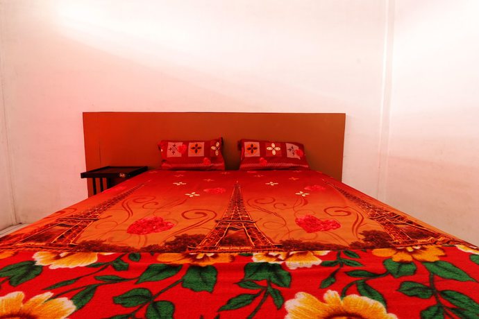 Imagen de la habitación del Hotel Sumber Pulo Mas. Foto 16