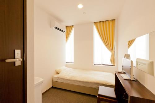 Imagen de la habitación del Hotel Suminoyu, Nagoya. Foto 5