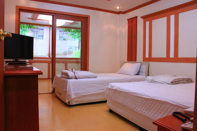 Imagen de la habitación del Hotel Sumjingang. Foto 16
