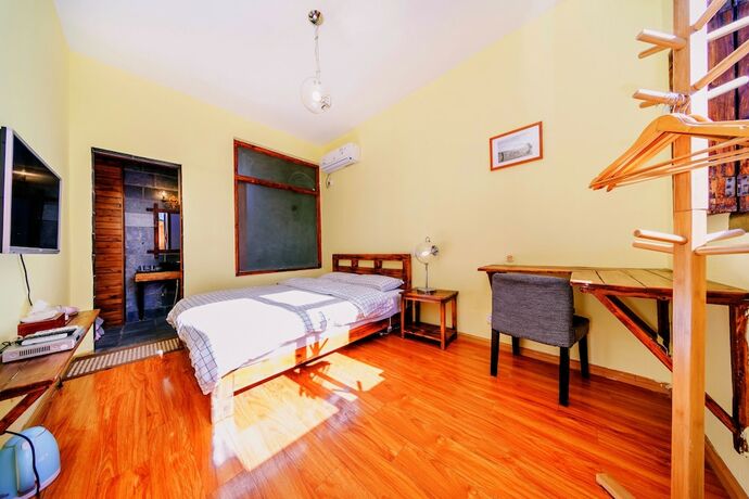 Imagen de la habitación del Hotel Summer Flowers Inn. Foto 11