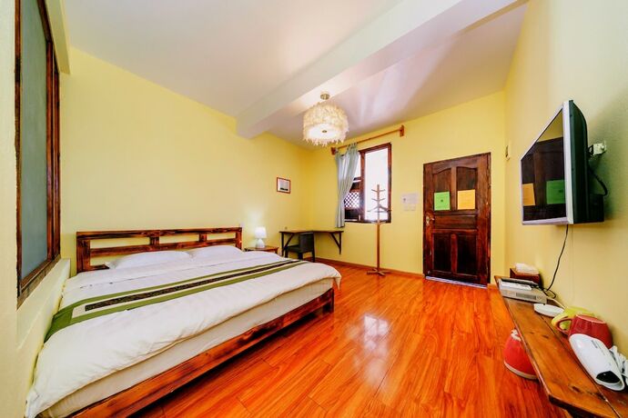Imagen de la habitación del Hotel Summer Flowers Inn. Foto 12