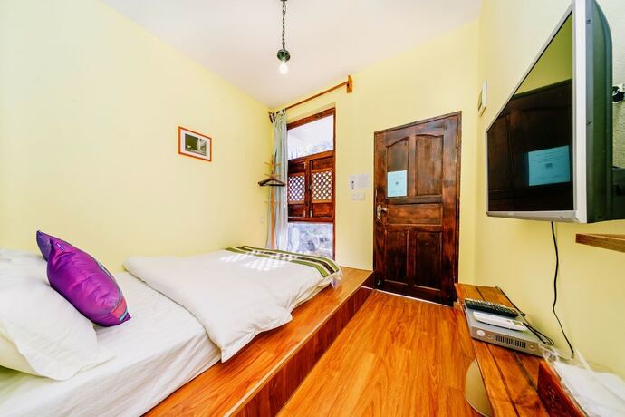 Imagen de la habitación del Hotel Summer Flowers Inn. Foto 13