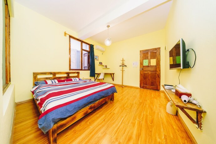 Imagen de la habitación del Hotel Summer Flowers Inn. Foto 17