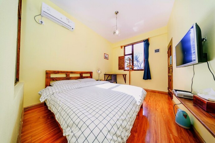 Imagen de la habitación del Hotel Summer Flowers Inn. Foto 21