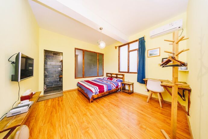 Imagen de la habitación del Hotel Summer Flowers Inn. Foto 22