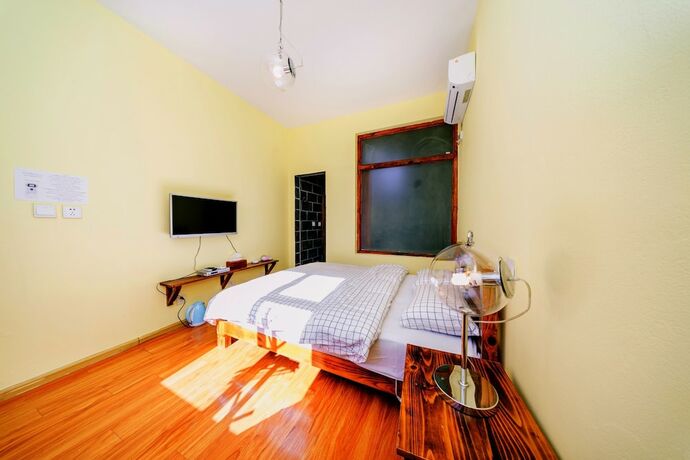 Imagen de la habitación del Hotel Summer Flowers Inn. Foto 25