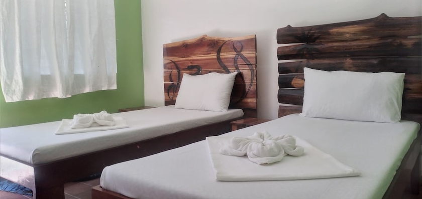 Imagen de la habitación del Hotel Summer Homes Beach Resort And Cottages. Foto 8