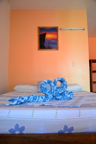 Imagen de la habitación del Hotel Summer Homes Beach Resort And Cottages. Foto 12