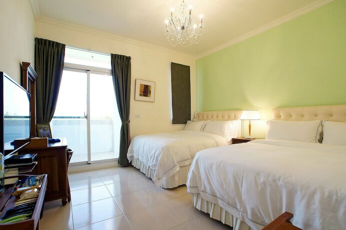 Imagen de la habitación del Hotel Summer Moonlight Vacation House. Foto 26