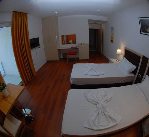 Imagen de la habitación del Hotel Summer Suite Hotel. Foto 9